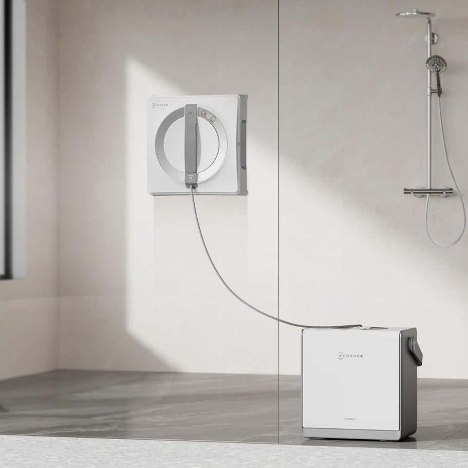Modern shower system with a control panel and water dispenser in a bathroom setting.