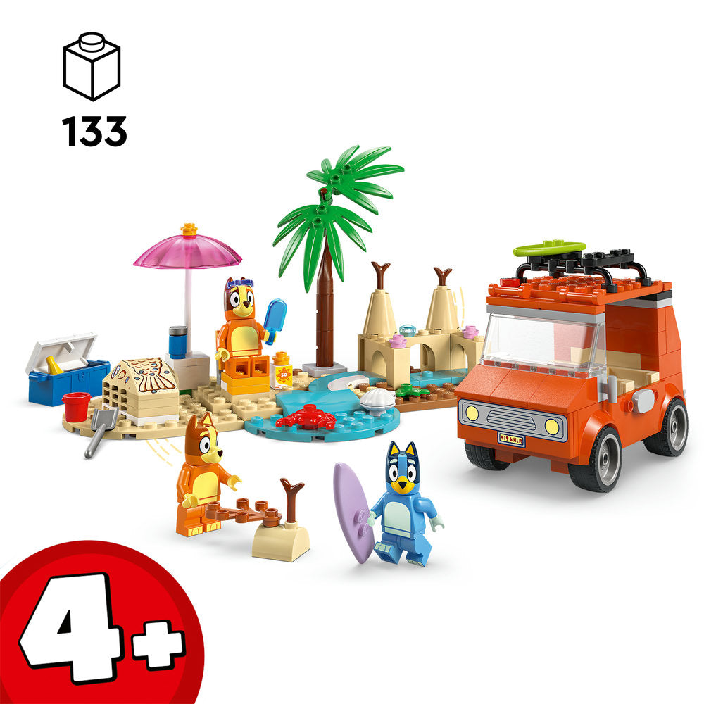 LEGO Bluey's Beach & Family Car Trip set 11202 containing 133 pieces with orange vehicle, blue and orange minifigures, pink umbrella, palm tree, sandcastle structures, surfboard and beach accessories on sand-coloured base with water feature