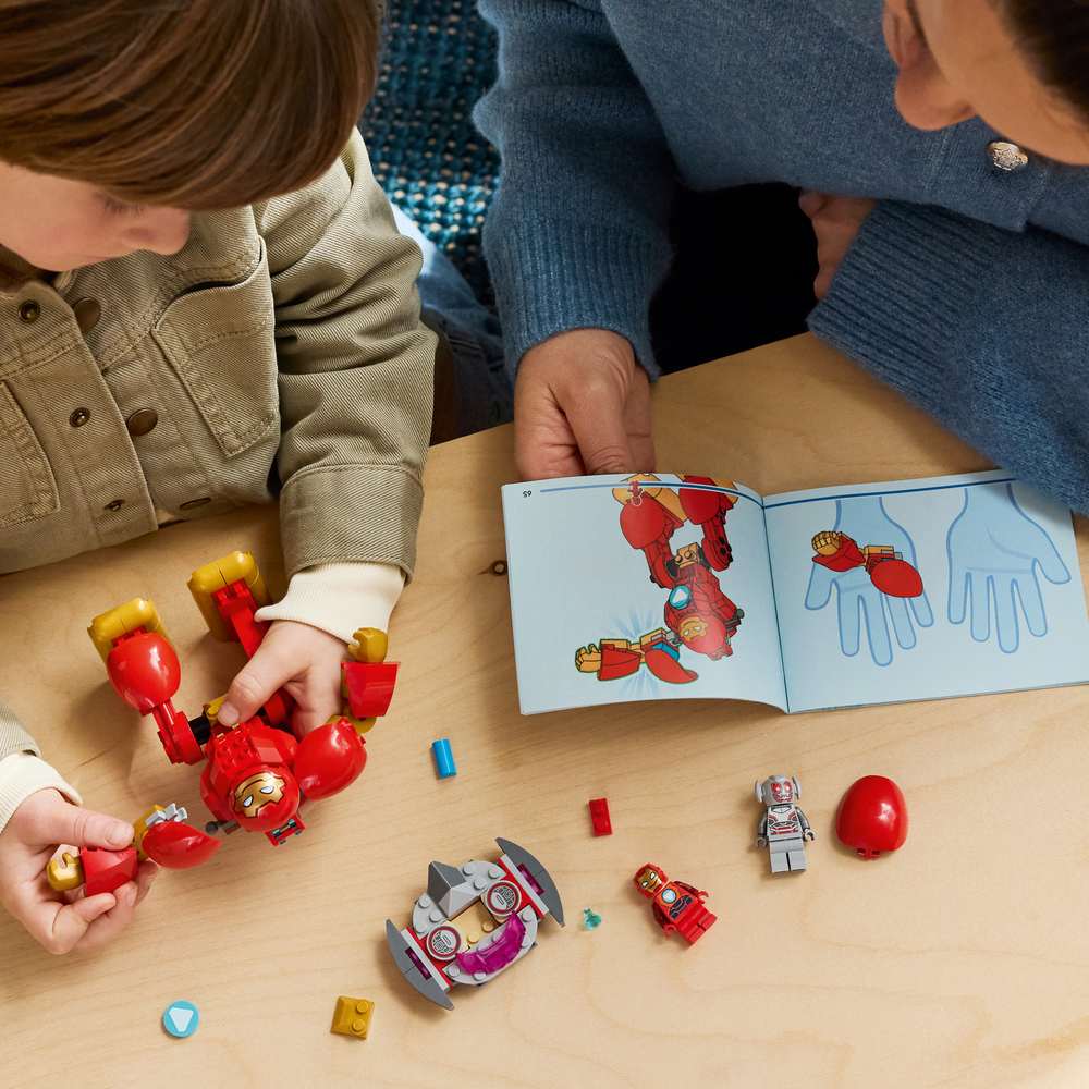 LEGO Disney Junior Marvel Ultron vs. Iron Man 11209 - a child building the set. 96 pieces. Ages 4+.