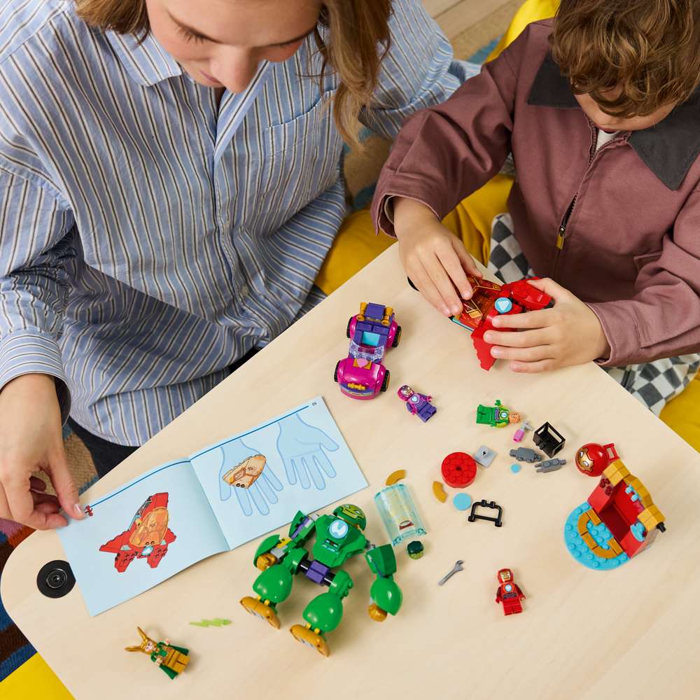 LEGO Disney Junior Marvel Loki vs. Team Iron Man 11211 - a child building the set. 204 pieces. Ages 4+.