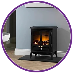 Black stove in a room with gray walls and wooden floor