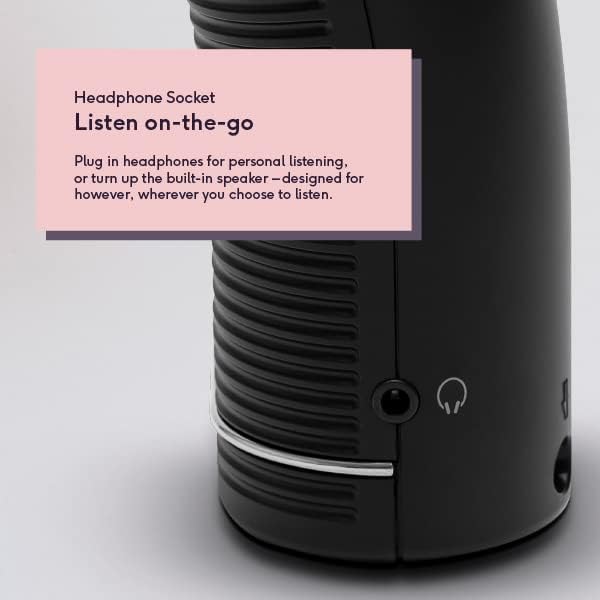 Black cylindrical Roberts portable DAB FM digital radio with headphone socket, featuring a built-in speaker and headphone icon, shown with pink informational label explaining listen on-the-go functionality