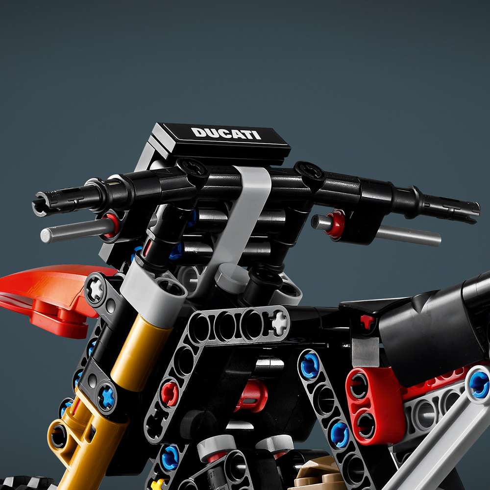 LEGO Technic Ducati Desmo450 MX Factory Motorcycle 42238 - close-up detail of the finished build. 457 pieces. Ages 10+.