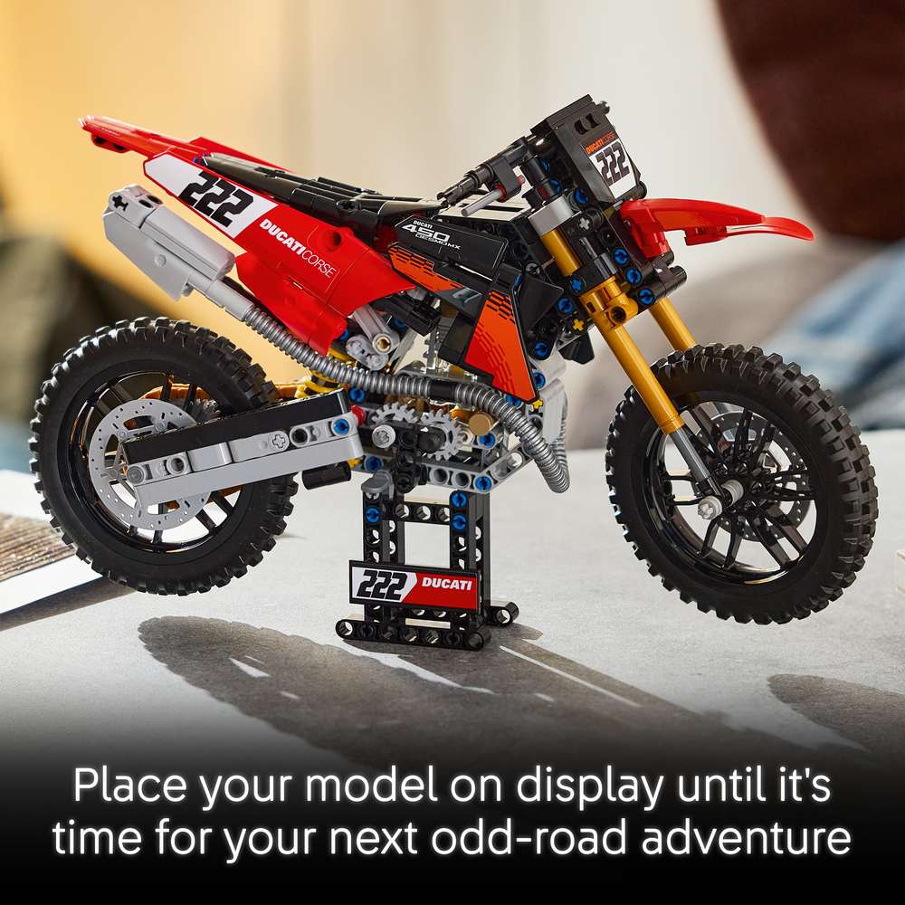 LEGO Technic Ducati Desmo450 MX Factory Motorcycle 42238 - captioned product view. 457 pieces. Ages 10+.