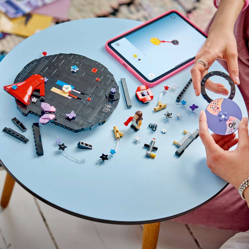 LEGO Editions Music Olivia Rodrigo's Vinyl 43028 - a child building the set. 360 pieces. Ages 10+.