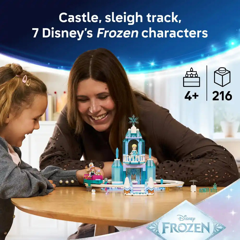 Adult and child playing with LEGO Disney Frozen Elsa's Ice Castle set featuring blue ice palace structure with snowflake topper, minifigures and accessories on wooden table, 216 pieces, age 4+
