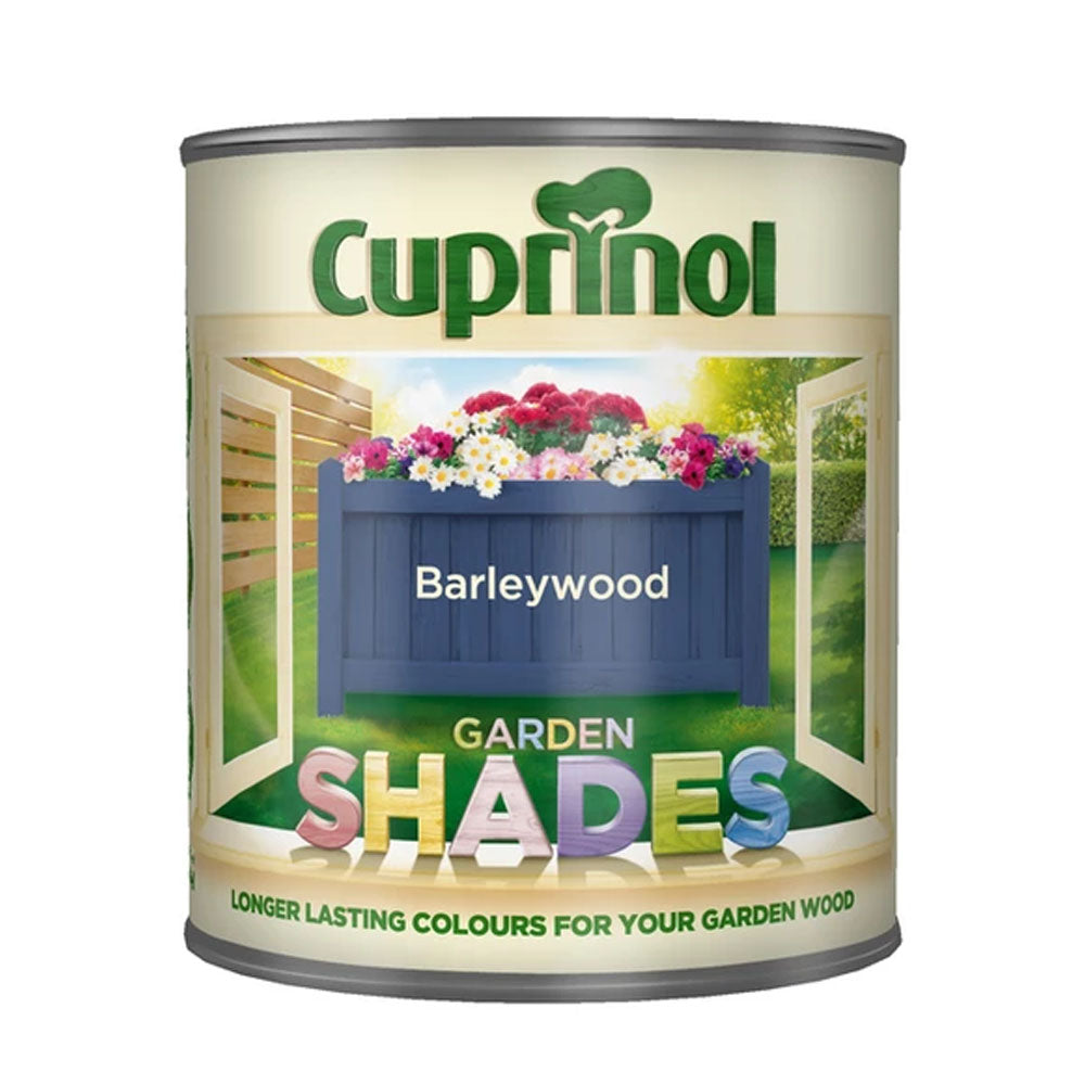 Cuprinol 2.5 litre Garden Shades Barleywood wood stain tin with navy blue planters containing colourful flowers displayed on green garden background