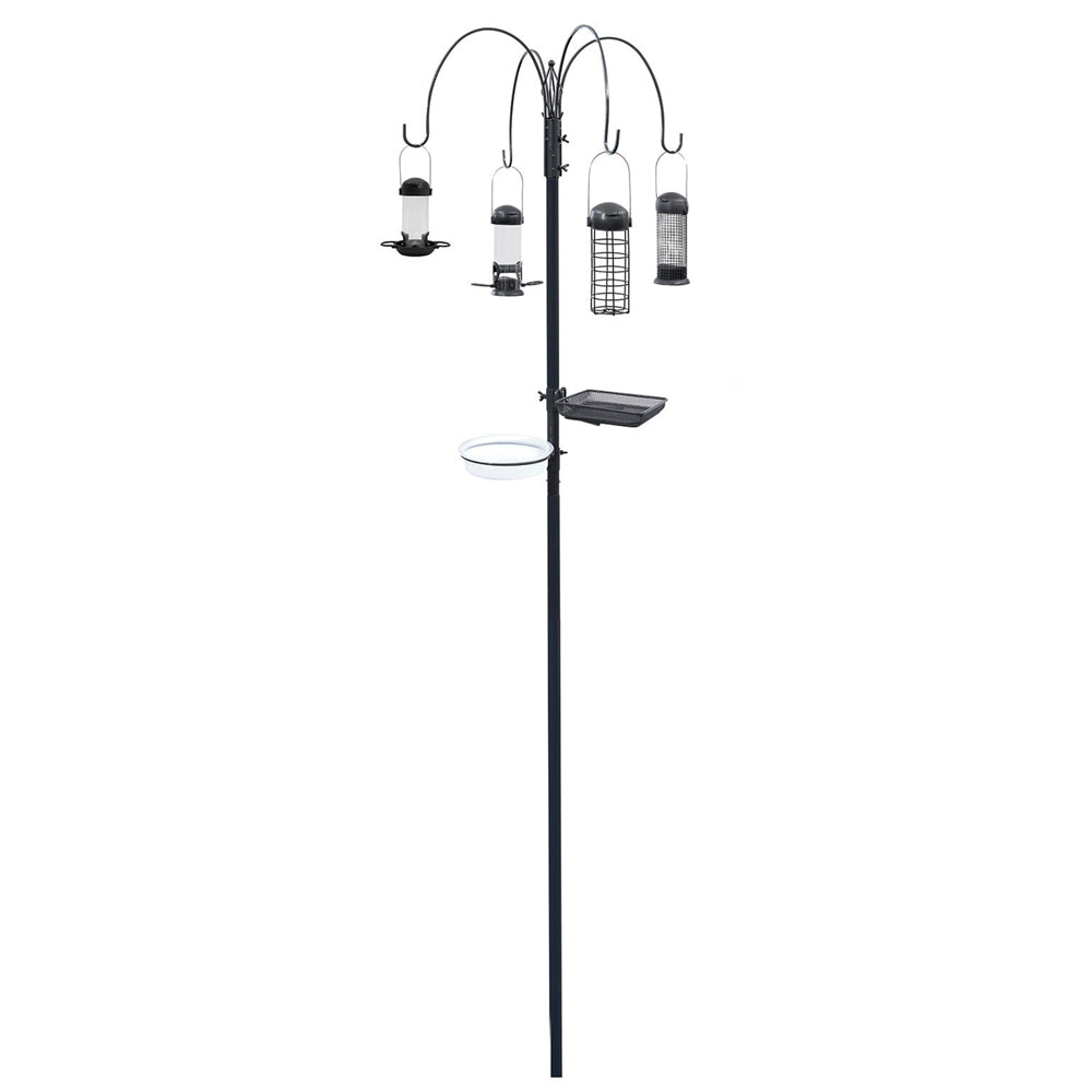 Black metal bird feeding station with four curved arms suspending various feeders including seed, suet, and mesh designs, featuring two circular base trays and a central pole on white background