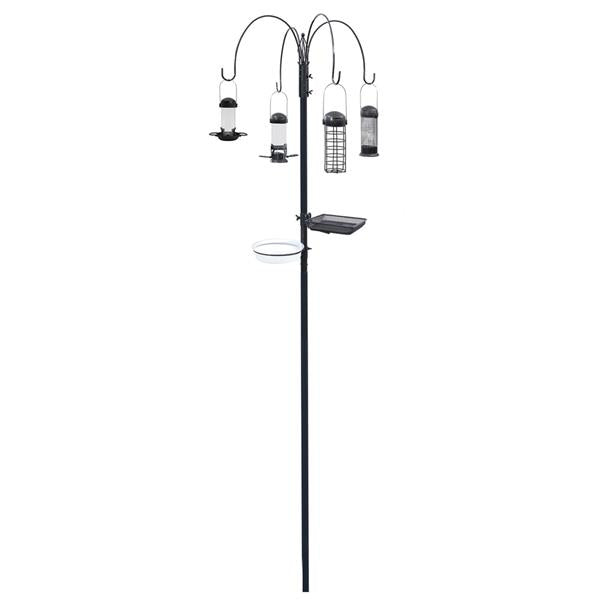 Black metal bird feeding station with four hanging feeders including tube and cage styles, central pole with platform tray and ring base, complete outdoor garden setup