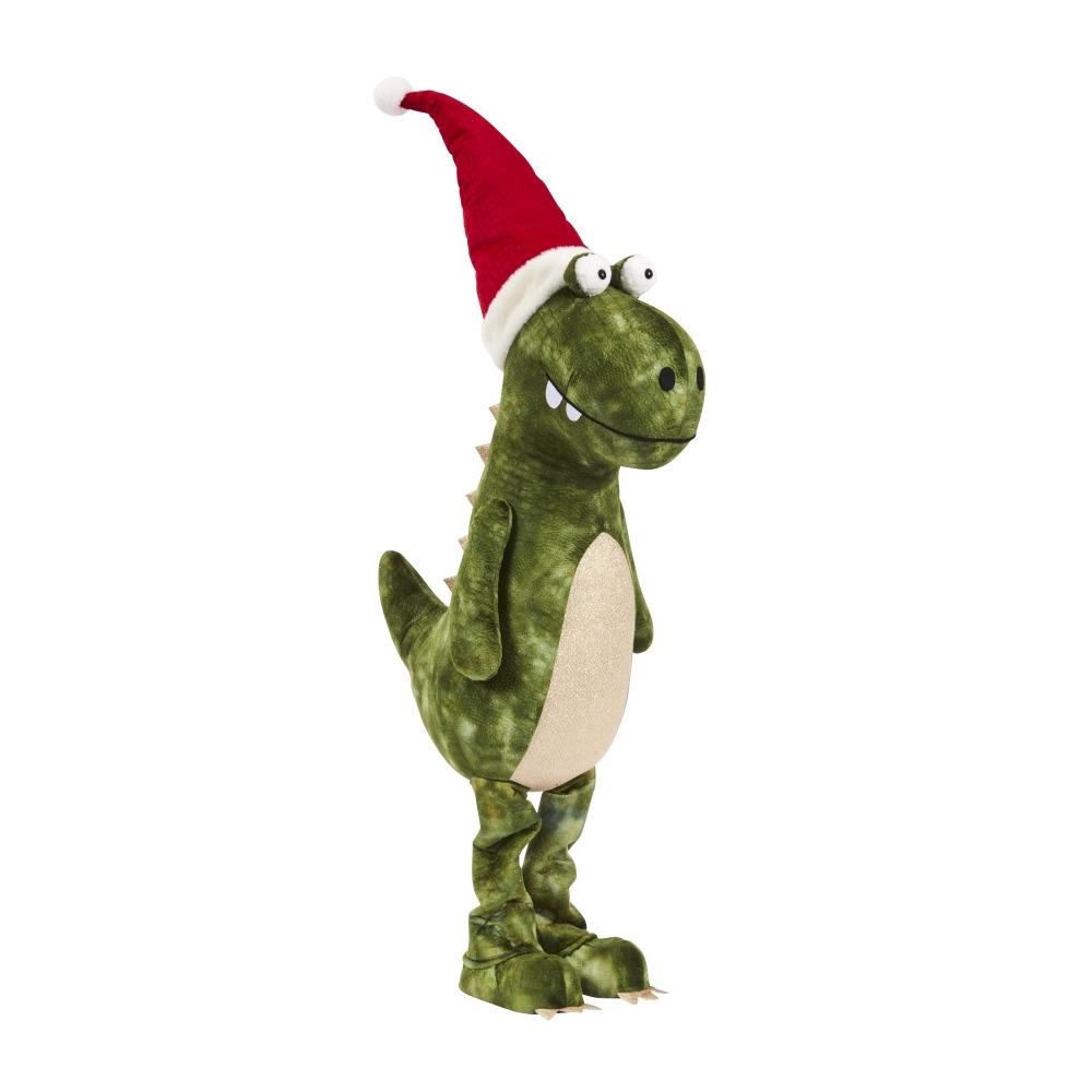 A green plush toy resembling a dinosaur wearing a red and white Santa hat.