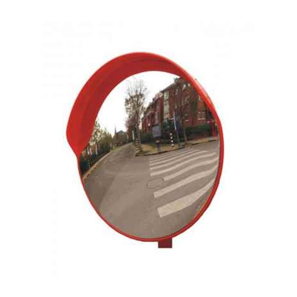 Red outdoor convex road safety mirror 60cm diameter with metal bracket mounted on pole reflecting street scene with crosswalk and buildings