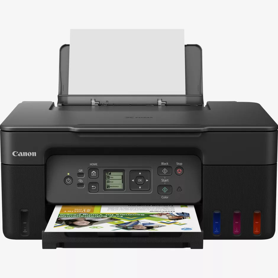 Canon printer with paper in the input tray and output tray on a white background