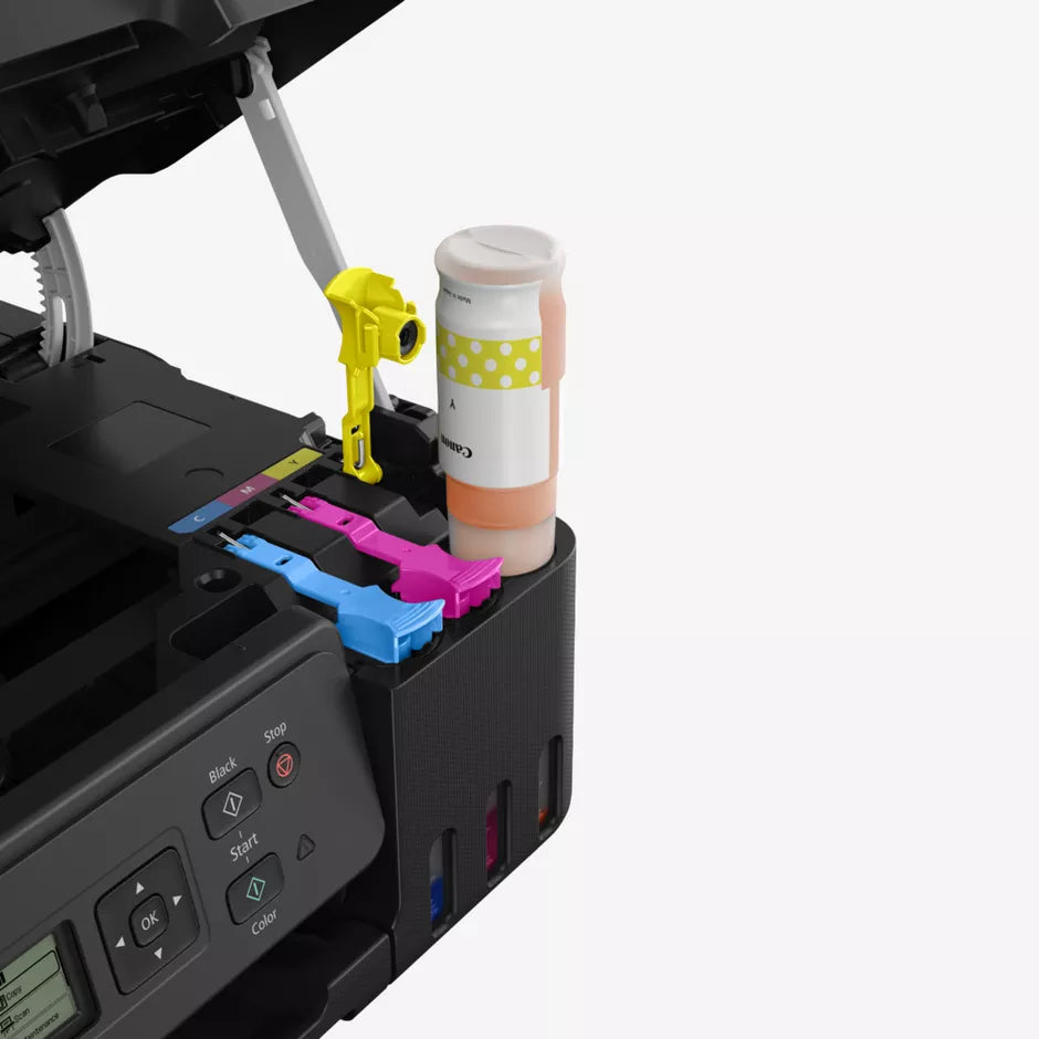 Printer with ink cartridges and a colorful cup on a white background