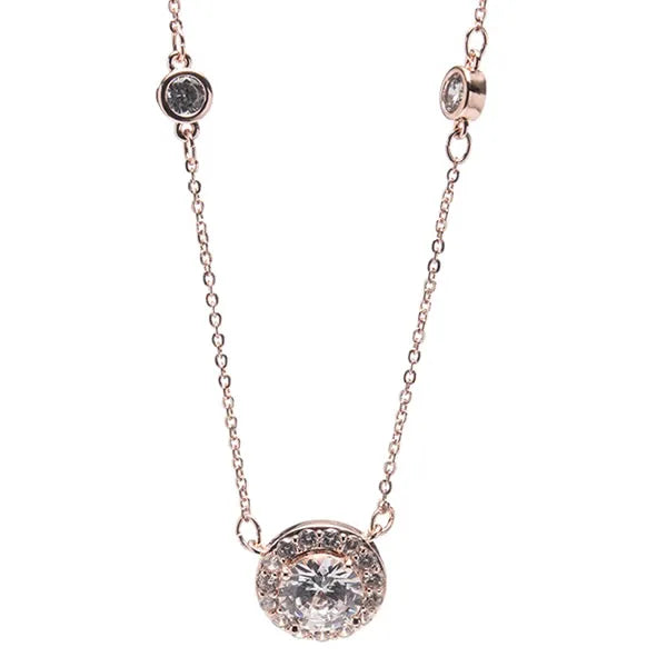 Rose gold circular diamond pendant necklace with round cut center stone and halo setting on delicate chain with accent diamonds