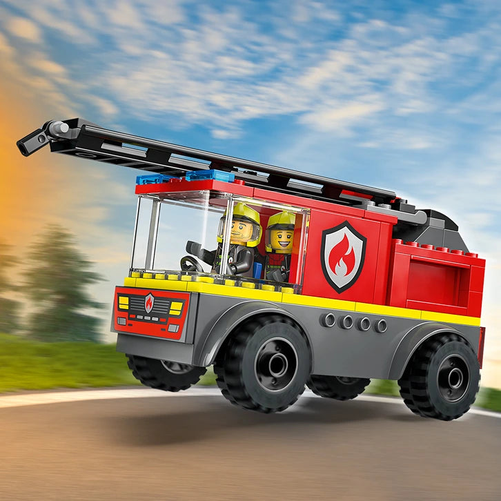 LEGO Fire Ladder Truck 60463 red and gray brick building set with extendable black ladder, yellow stripe details, two minifigure firefighters in cab, and flame emblem on side against sky background