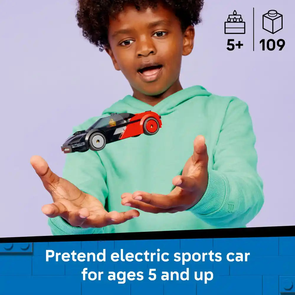 Young child wearing a mint green hoodie holding a red and black LEGO electric sports car against a purple background, with age rating 5+ and 109 pieces displayed in top right corner
