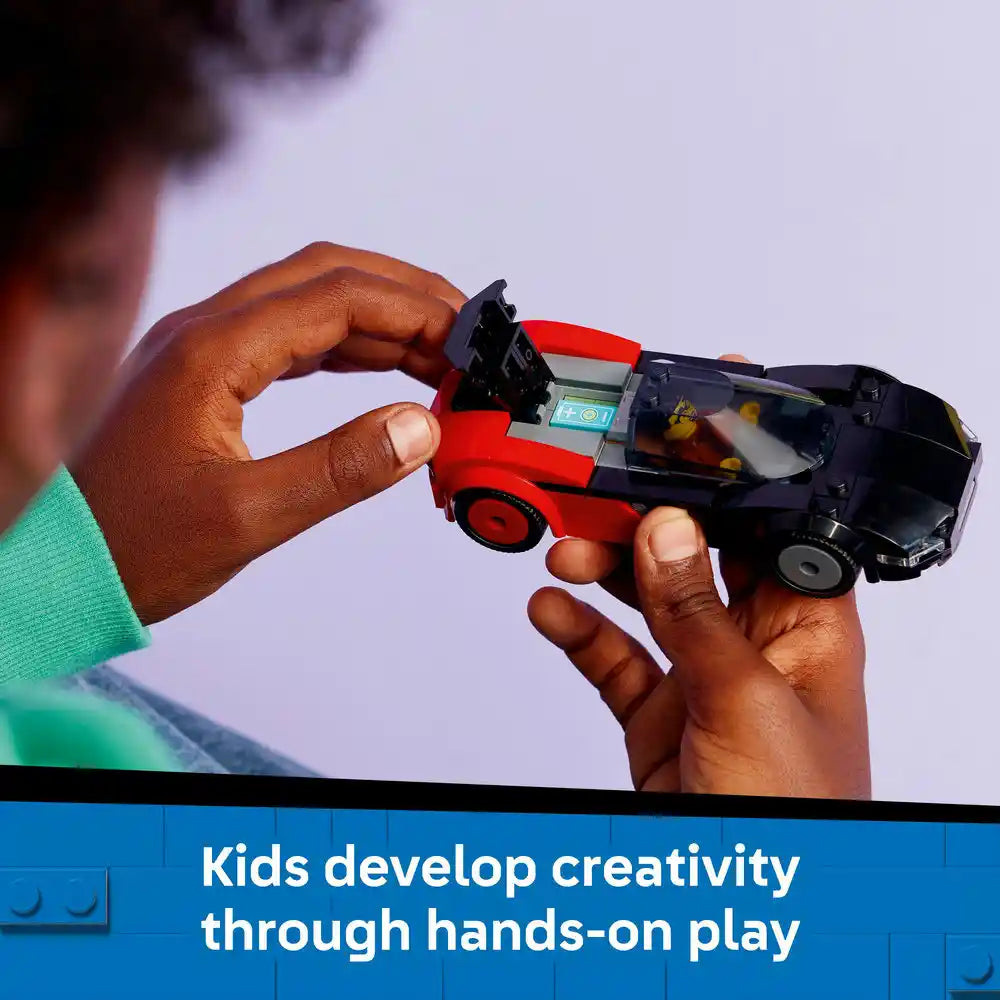 Child's hands holding red and black LEGO EV Supercar model against light blue sky background with text about creativity development through hands-on play