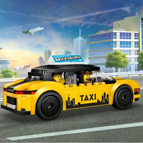 LEGO yellow taxi car set 60487 with black roof and taxi markings, featuring minifigures and Bricksburg sign, displayed in urban cityscape scene
