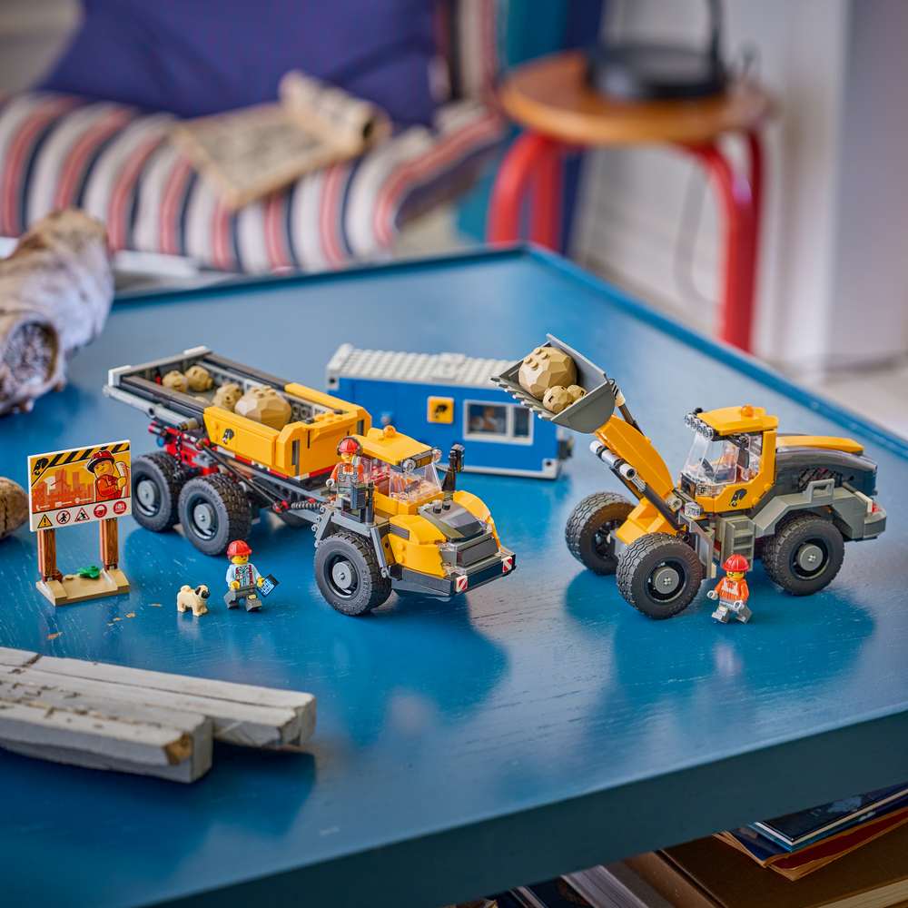 LEGO City Dump Truck & Front End Loader 60494 - the finished build shown in a home setting. 1132 pieces. Ages 8+.