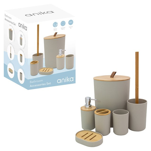 Anika 6-piece bathroom accessory set in stone grey featuring ceramic containers with bamboo lids and accents, including toilet brush holder, soap dispenser, toothbrush holder, soap dish and waste bin, displayed with product packaging box