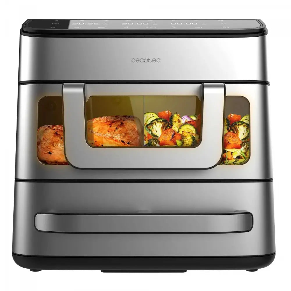 Cecotec Cecofry FoodCourt stainless steel air fryer oven with 18 litre capacity showing cooked salmon, roasted vegetables and broccoli through viewing window, digital display panel on top and handle at front