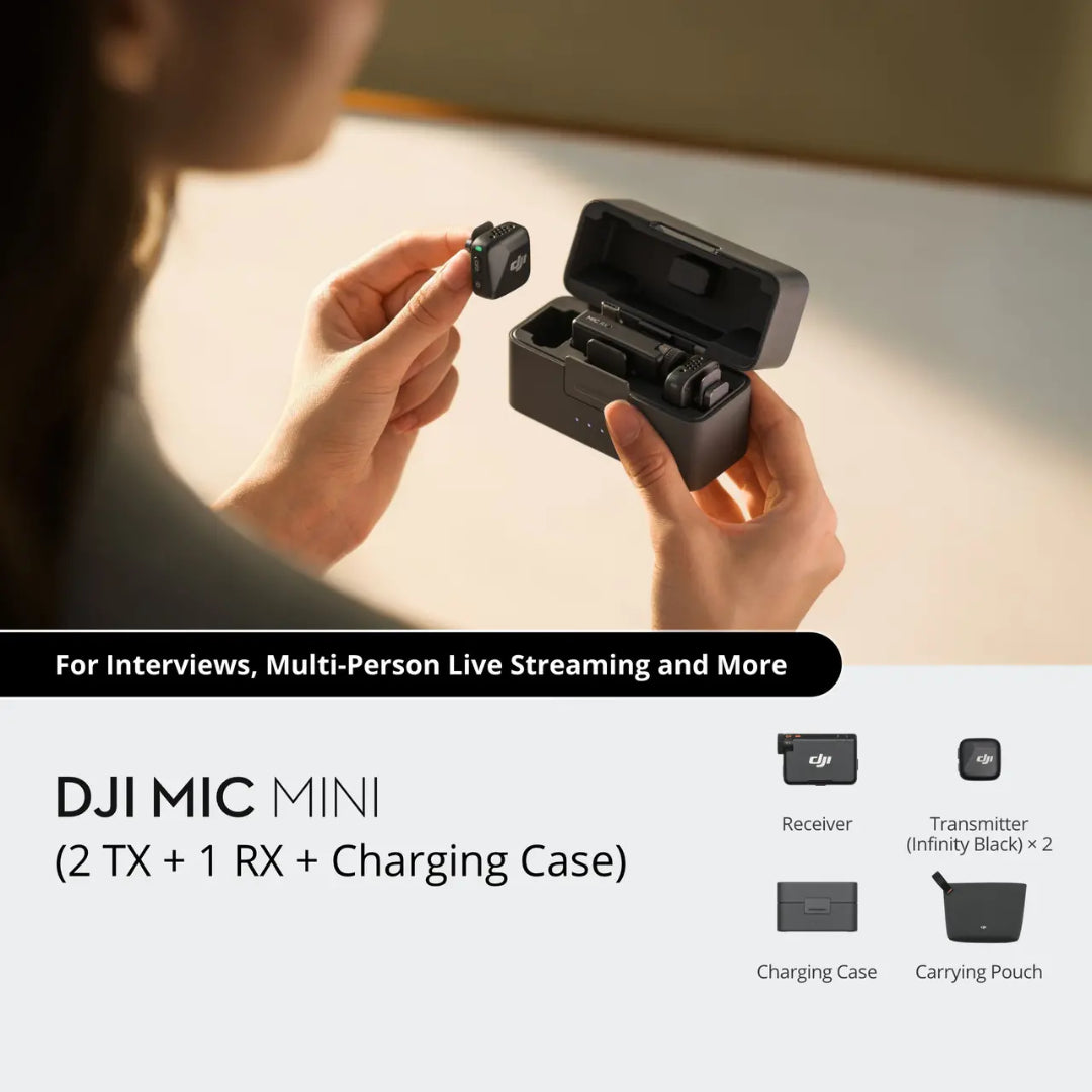 Person holding DJI Mic Mini wireless microphone system showing black transmitter and receiver units with charging case and carrying pouch, displayed for interviews and live streaming applications