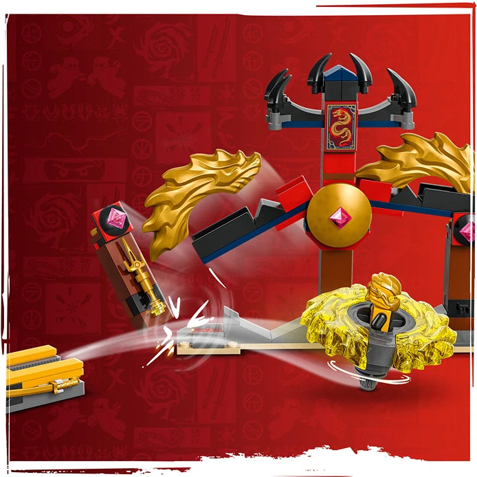 LEGO Ninjago Dragon Spinjitzu Battle Pack 71826 featuring golden dragon-themed building pieces, red and blue ninja weapon accessories, and decorative Asian-inspired architecture elements against a red background