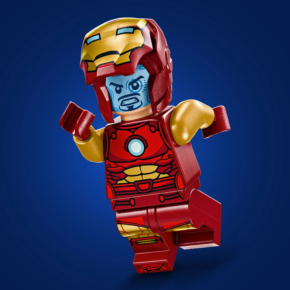 LEGO Iron Man minifigure with red and gold armor, blue face, and gold gauntlets posed against a blue background