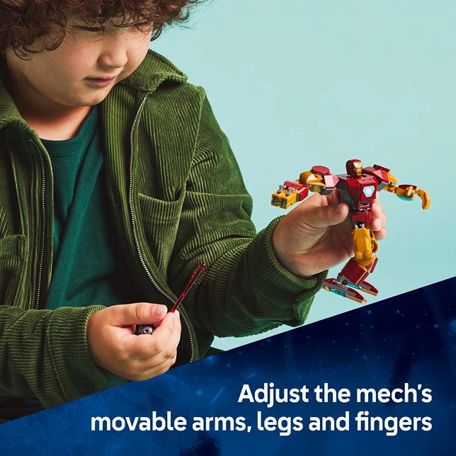 Child wearing green corduroy jacket holding LEGO Iron Man Mech figure with movable red and gold arms against blue background with product text