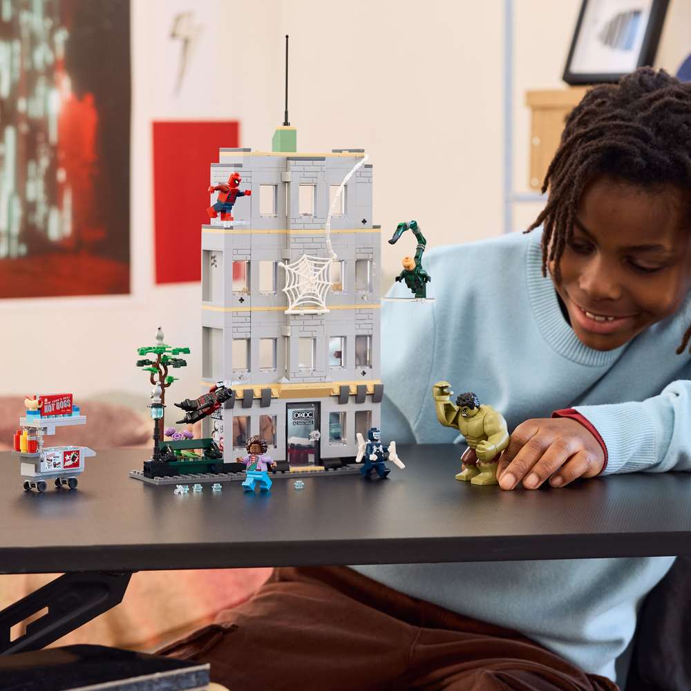 LEGO Super Heroes Spider-Man vs. Hulk Epic Clash 76350 - a child playing with the finished build. 534 pieces. Ages 8+.