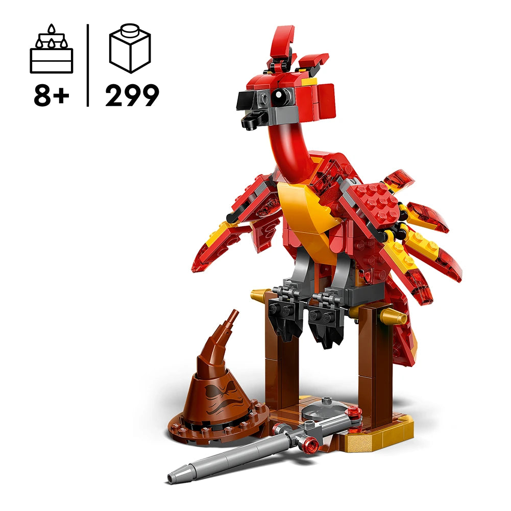 LEGO Fawkes Dumbledore's Phoenix set 76448 featuring a red and gold brick-built phoenix with articulated wings, perched on a wooden stand with accessories including a cannon and launcher, recommended for ages 8 and up with 299 pieces