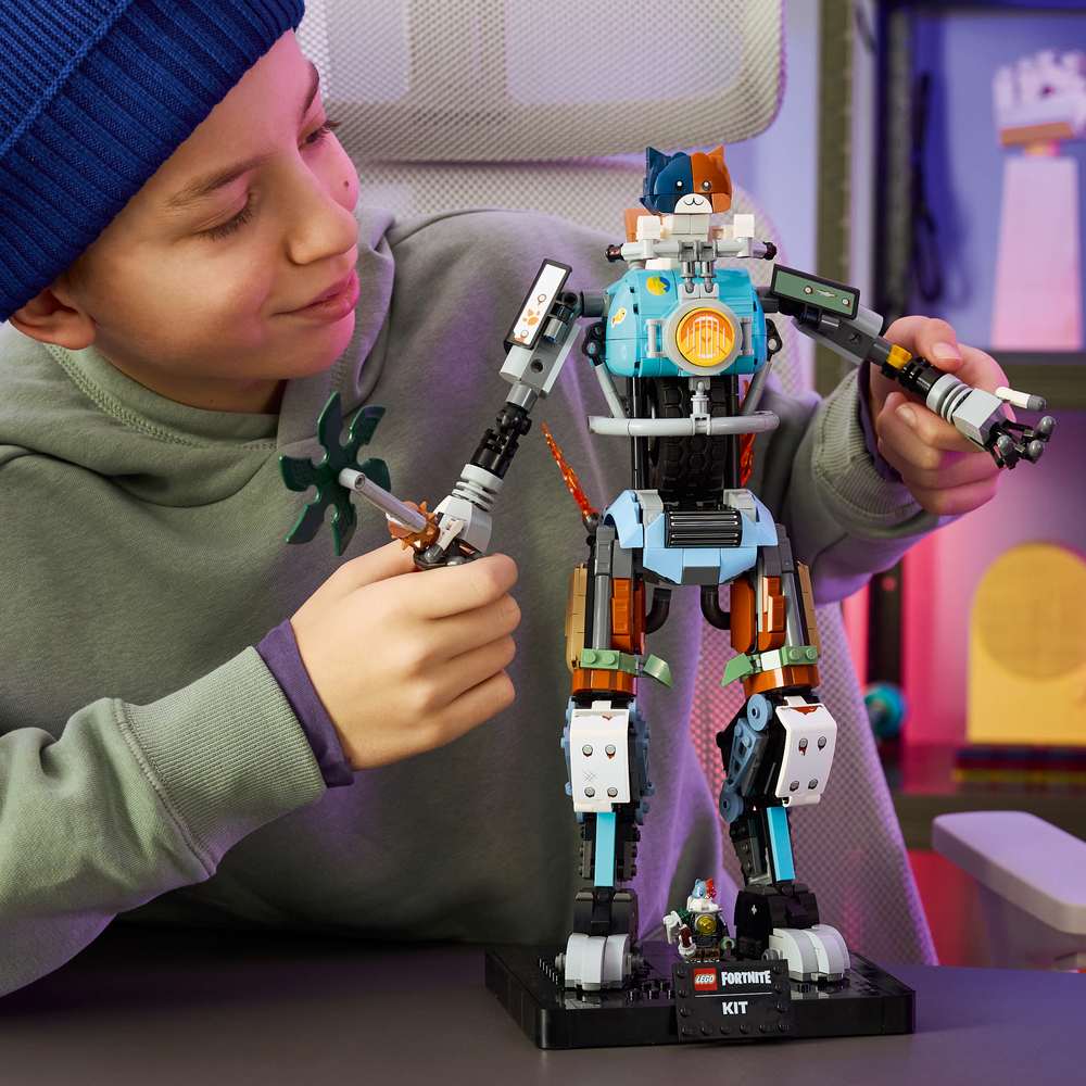 LEGO Fortnite KIT 77081 - a child playing with the finished build. 1230 pieces. Ages 12+.