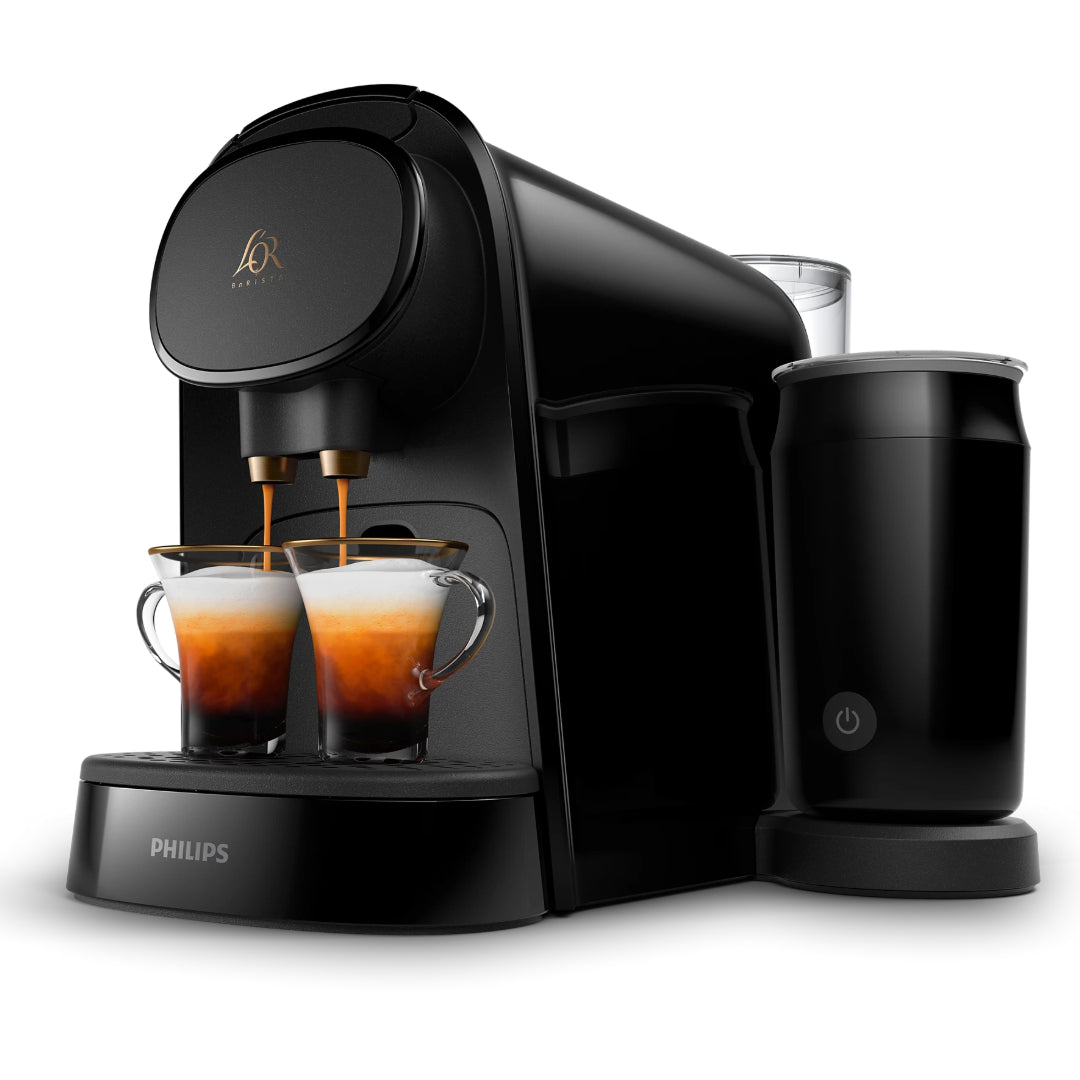 Philips L'OR Barista Deep Black capsule coffee machine with milk frother, featuring two espresso cups with crema, black body with gold accents, and separate black milk frothing jug with power button