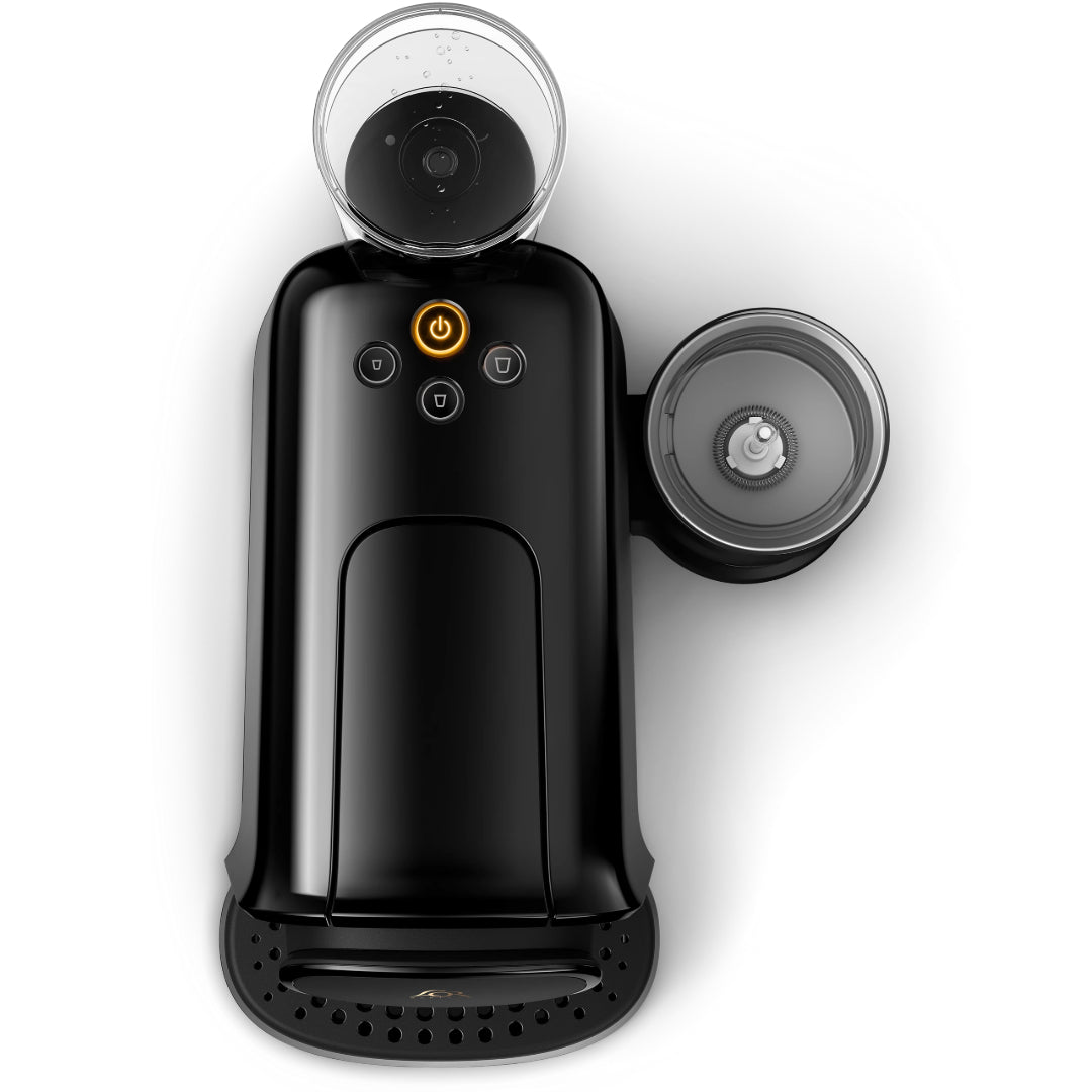 Philips L'OR Barista Deep Black capsule coffee machine with illuminated power button, control panel, clear water tank on top, and detachable milk frother attachment on the right side, shown from front view against white background