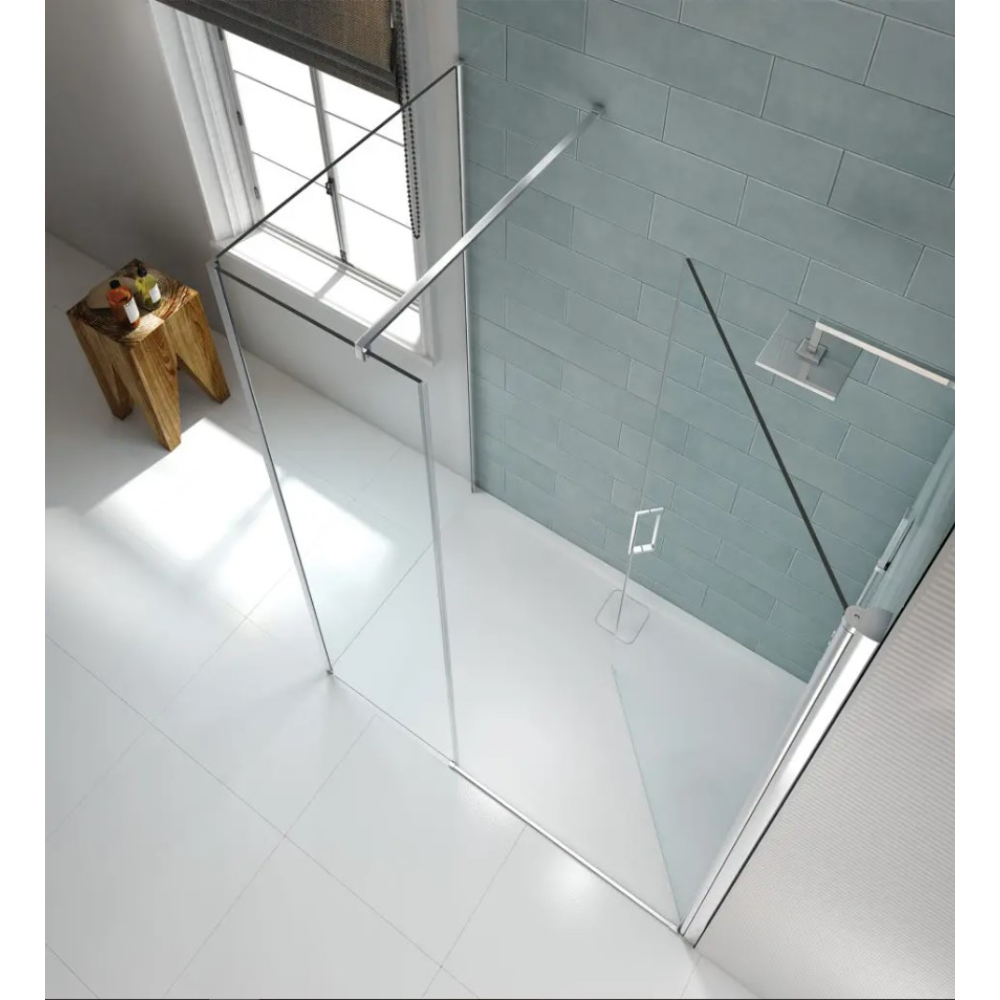 Merlyn 8 Series frameless pivot shower door with chrome hardware installed in modern bathroom with white floor tiles, frosted glass panel, and wooden stool accessory
