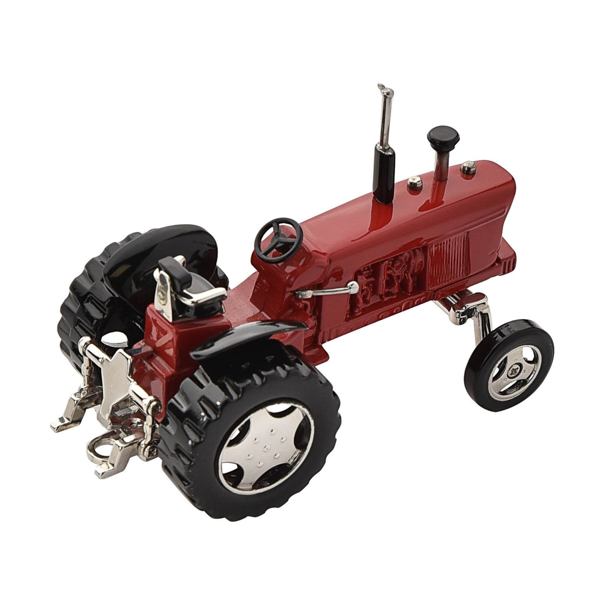 Red and black miniature die-cast tractor clock with Roman numeral dial, featuring detailed metal steering wheel, black rubber tires, chrome accents, and working clock face mounted on the engine block