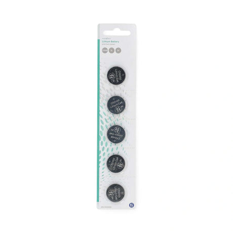 Pack of four   CR2450 batteries in a clear plastic package on a white background