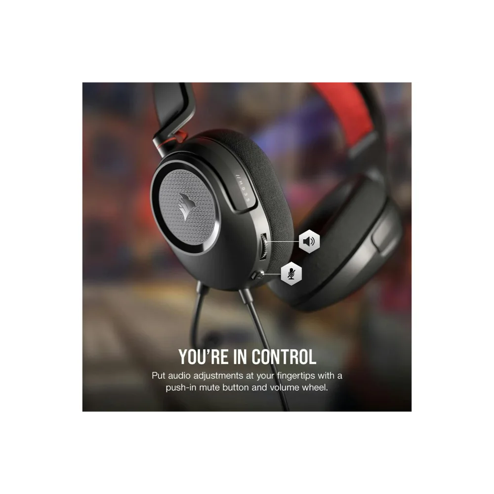 Corsair HS35 v2 gaming headset in black with gray ear cup detail, showing volume wheel and mute button controls with red headband accent, displayed against blurred gaming environment background