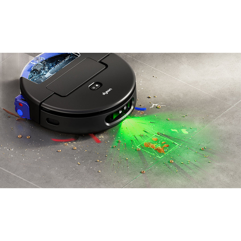 Dyson Spot+Scrub AI robot vacuum with black circular body and blue water tank displayed on grey tile floor with green laser detection grid visible, detecting scattered debris and cereal pieces