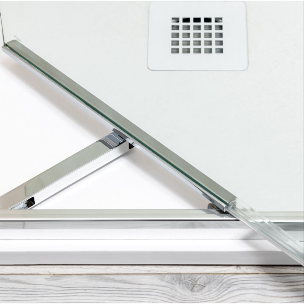 Flair ETO Infold shower door in brushed nickel finish showing hinged glass panel and metal frame hardware against white wall with wooden floor