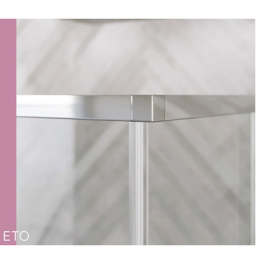 Flair ETO chrome sliding shower door with clear glass panels and metal frame detail against marble tile background