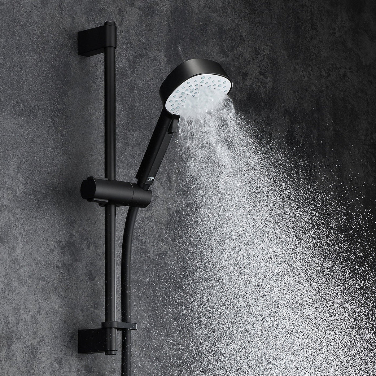 black shower head with hose and control on a white background