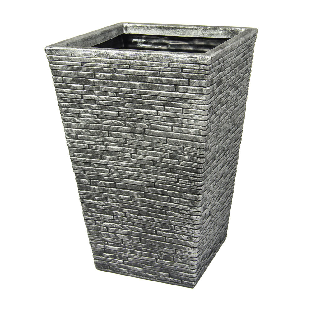 Tall rectangular garden planter pot with stacked slate stone brick pattern exterior in grey and charcoal tones, featuring tapered sides and open top with black interior liner