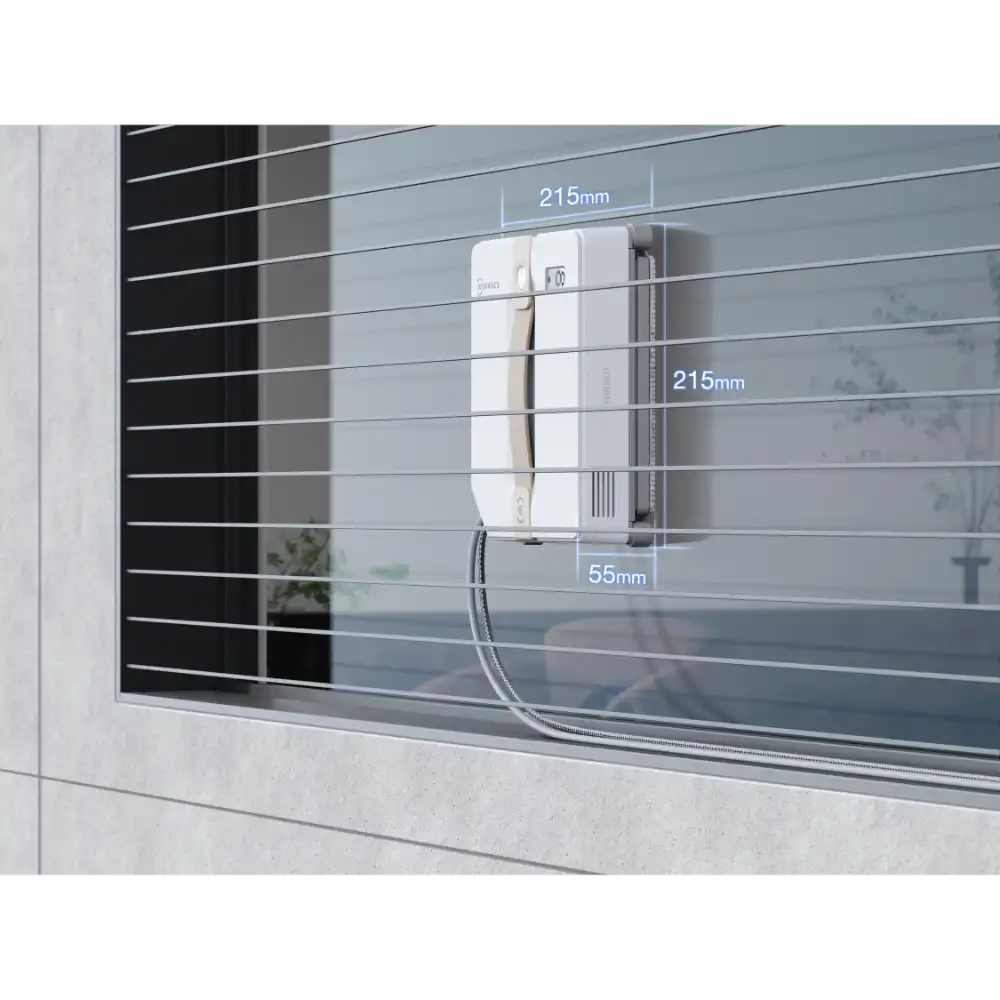 Ecovacs Winbot Mini beige robot window vacuum cleaner mounted on glass window with dimensions showing 215mm height and 55mm depth, white device with control panel attached to window pane