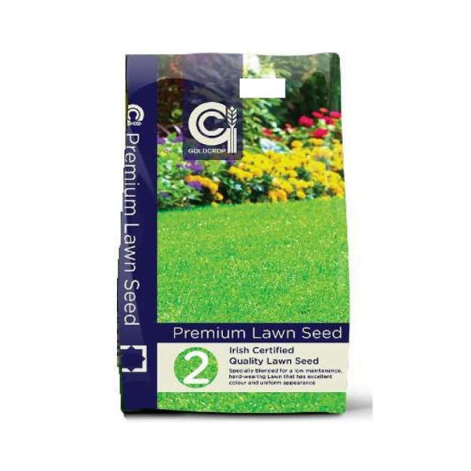 A bag of C&K Premium Lawn Seed, Irish Certified Quality Lawn Seed, featuring a green and purple package design with a picture of a flowered garden on the front.