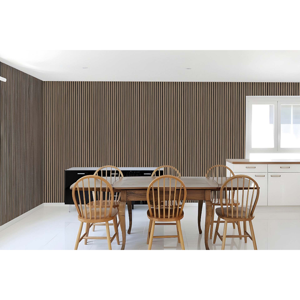 Modern dining room with wooden table, natural wood Windsor chairs, vertical slat acoustic wall paneling in dark wood finish, white ceiling, and contemporary kitchen cabinetry with large window