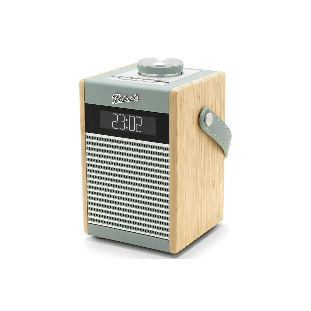 Roberts Rambler Midi DAB+ FM radio with Bluetooth in duck egg blue and natural wood finish, featuring digital display showing 23:02, metal speaker grille, top-mounted tuning dial, and carrying strap