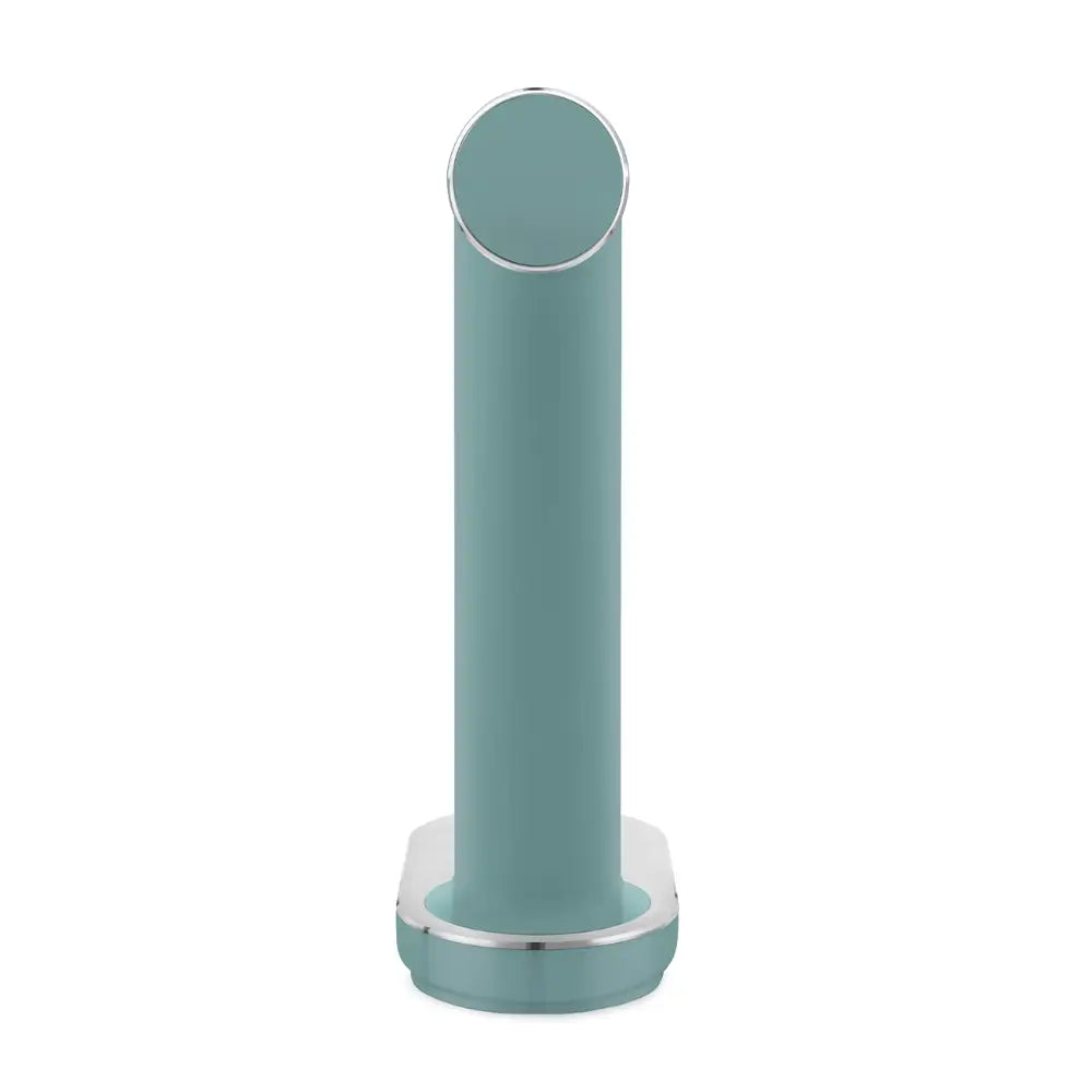 Smeg Sparkling Water Soda Maker in Emerald Green with cylindrical body, circular top dispenser, chrome accents and matching base