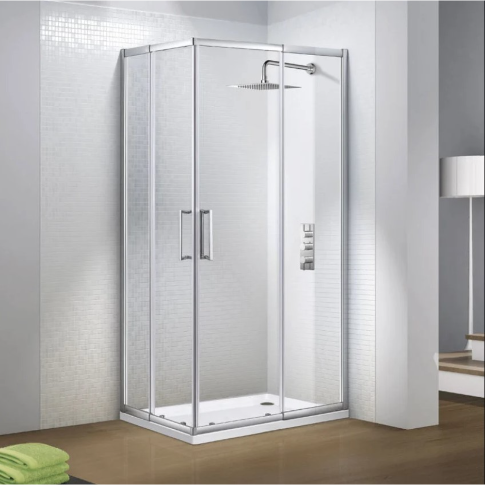Modern chrome and glass corner shower enclosure with sliding doors, white subway tile walls, rainfall showerhead and body jets in contemporary bathroom setting