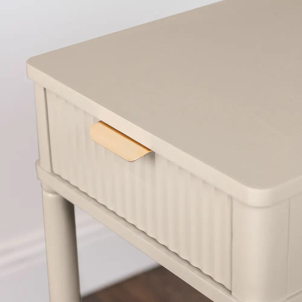 Tara Lane Parson 1 Drawer Accent Table in oyster cream with vertical ribbed detailing and natural wood handle, modern minimalist design on angled legs